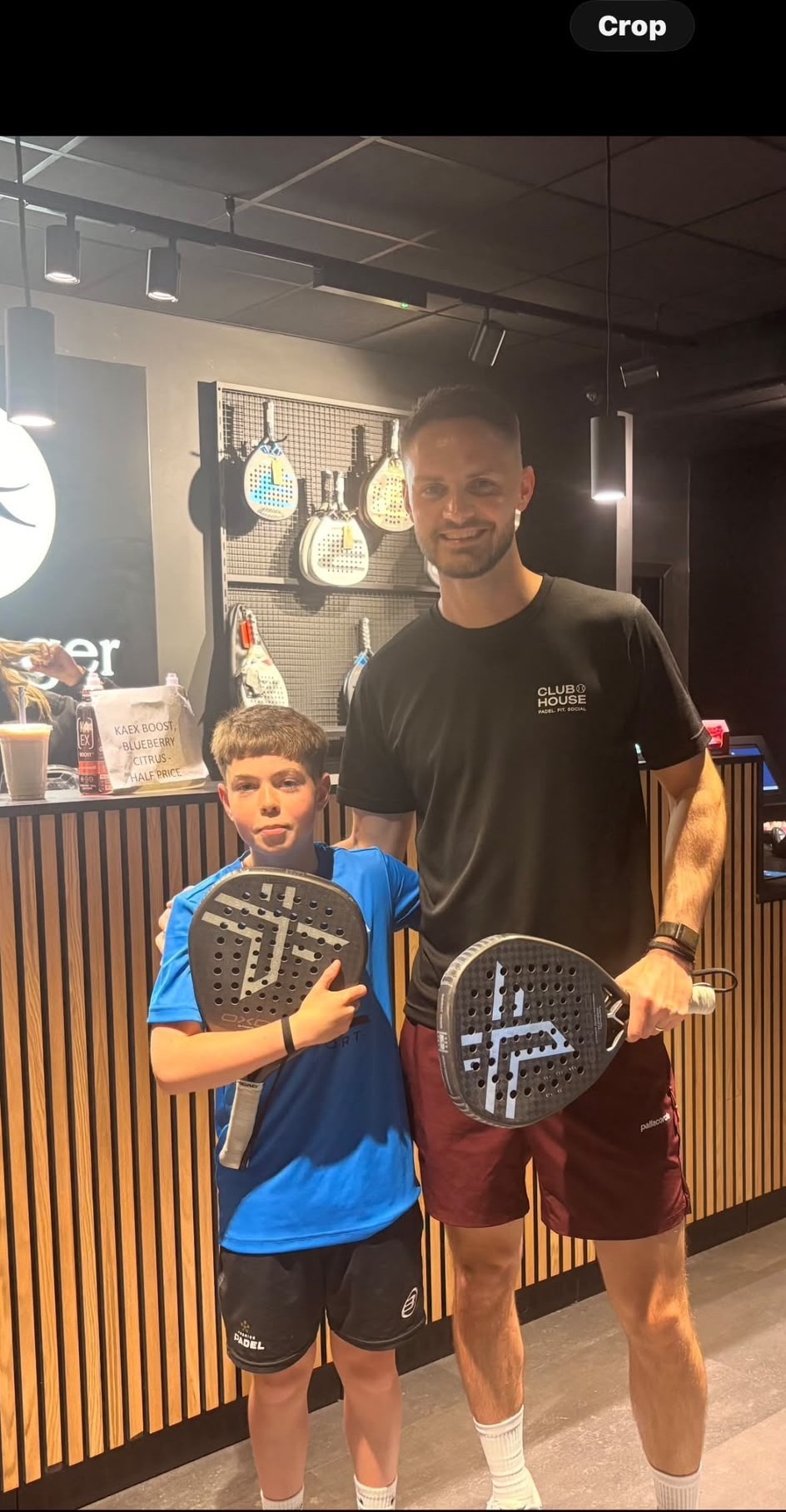 Marcus with a junior player at Clubhouse Blackburn